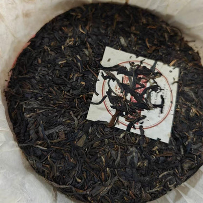 2005 Yunnan Caoguodi Seven Cake Raw Pu-erh Tea, 357g
