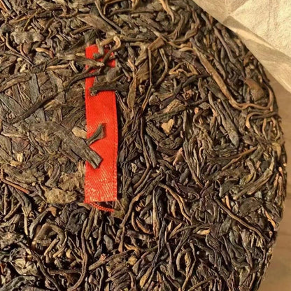 Yiwu Tea King Ancient Tree Raw Pu-Erh Tea 2006 – 357g