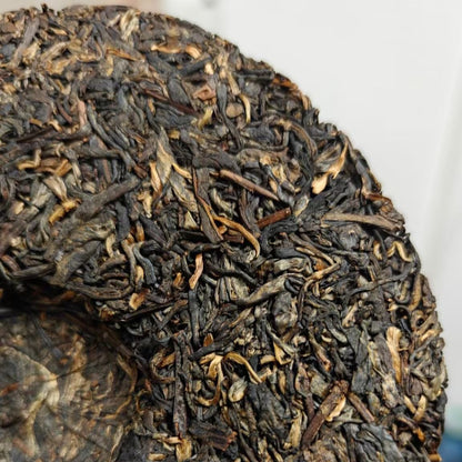 2006 Shuangxiong Yiwu Mingqian Spring Tips Raw Pu-erh Tea Cake, 357g, from Yunnan
