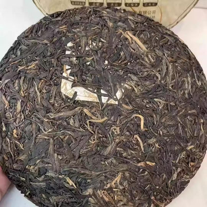 Douji 2015 Bulang Mountain Raw Puerh Tea Cake 357g - Intense Flavor Spring Tea Stone Mold Pressed