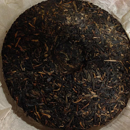 2006 Shuangxiong Yiwu Mingqian Spring Tips Raw Pu-erh Tea Cake, 357g, from Yunnan