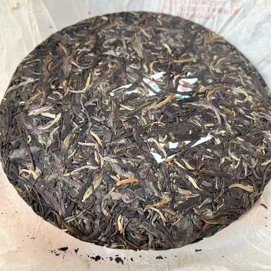 Xinghai Tea Factory Ancient Tree Ban Zhang King Raw Pu-Erh Tea 2006 – 357g