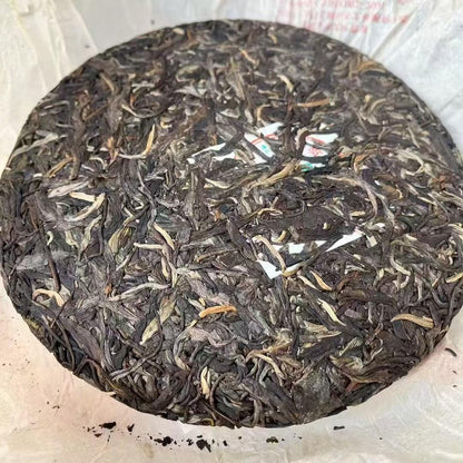 Xinghai Tea Factory Ancient Tree Ban Zhang King Raw Pu-Erh Tea 2006 – 357g