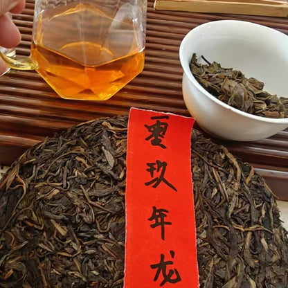 2009 Yiwu Longtanqing Raw Pu-erh Tea Cake, 357g, from Yunnan