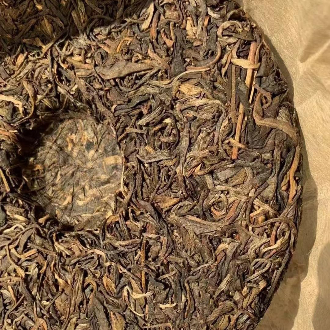 Yiwu Tea King Ancient Tree Raw Pu-Erh Tea 2006 – 357g
