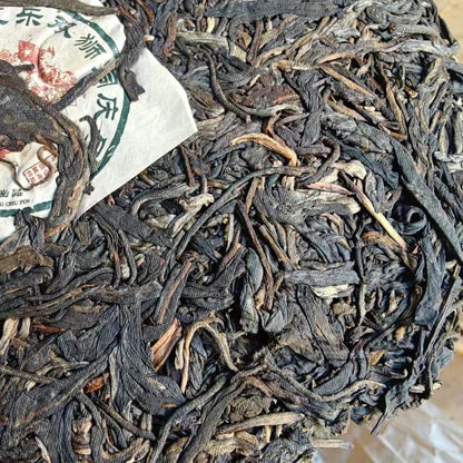 2010 Yongle Shuang Shi Tong Qing Hao Raw Pu-erh Tea Cake, 357g, from Yunnan