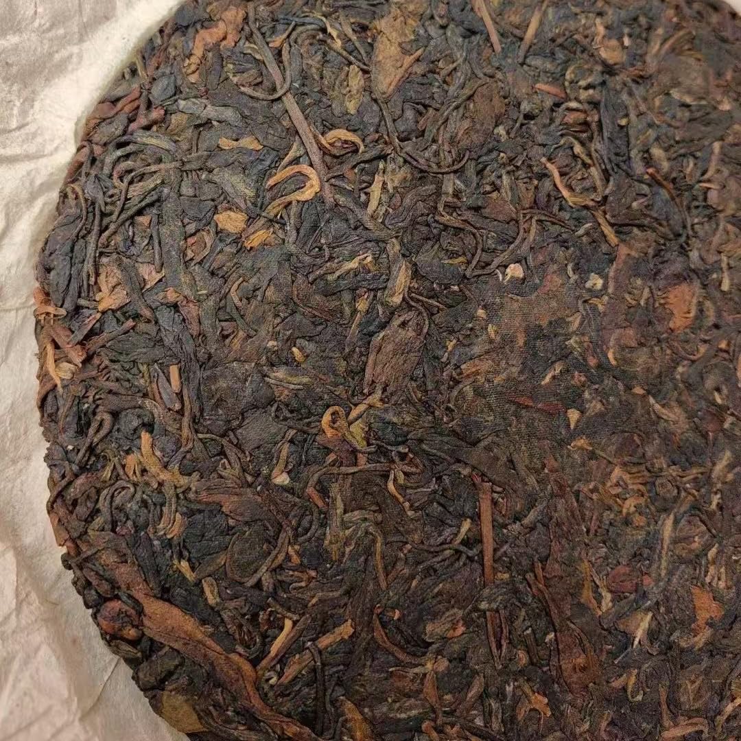 1970s Tian Xinhao Raw Pu-erh Tea Cake, 357g, from Yunnan