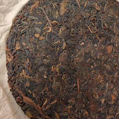 1970s Tian Xinhao Raw Pu-erh Tea Cake, 357g, from Yunnan