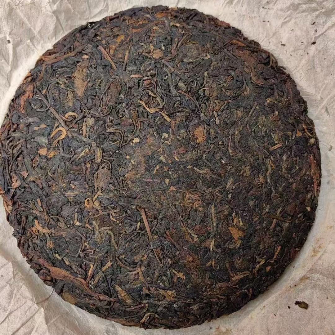 1970s Tian Xinhao Raw Pu-erh Tea Cake, 357g, from Yunnan