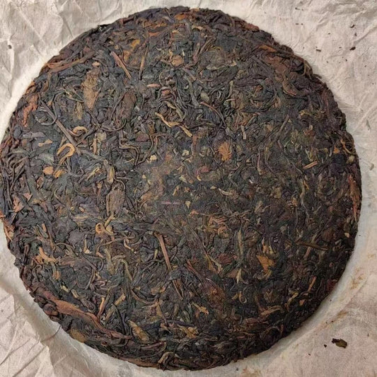 1970s Tian Xinhao Raw Pu-erh Tea Cake, 357g, from Yunnan