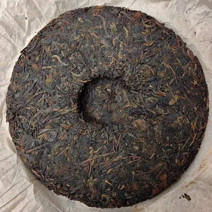1970s Tian Xinhao Raw Pu-erh Tea Cake, 357g, from Yunnan