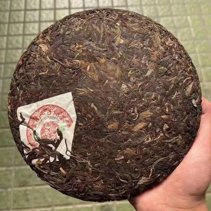 Ba Jiao Ting Qiaomu Tea King Raw Pu-Erh Tea 2005 – 357g