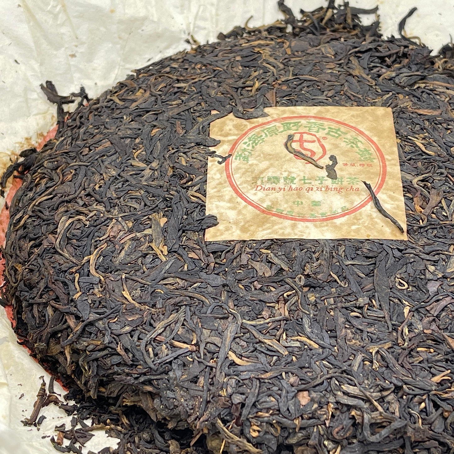 2004 Dian Yi Hao Menghai Wild Fragrance Ancient Tree Raw Pu-erh Tea Cake, 400g, from Yunnan