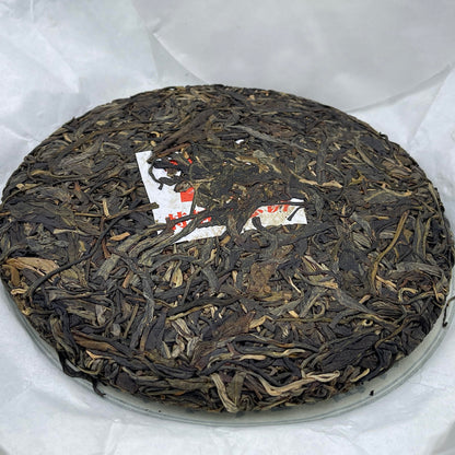 2019 Shengyu Wolongxuan 70th Anniversary Commemorative Raw Pu-erh Tea Cake, 357g, from Yunnan