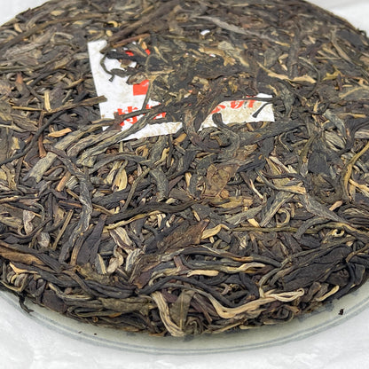 2019 Shengyu Wolongxuan 70th Anniversary Commemorative Raw Pu-erh Tea Cake, 357g, from Yunnan