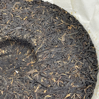 Xishuangbanna Purple Juan 2012 Raw Pu-Erh Tea Cake 400g