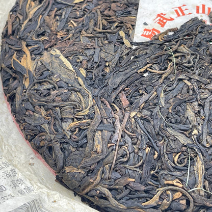 2006 Yiwuzheng Mountain Wild Raw Pu-erh Tea Cake, 380g