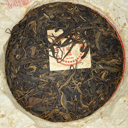 Xishuangbanna Yiwu Zhengshan Wild Green Cake Raw Pu-Erh Tea 2006 – 380g