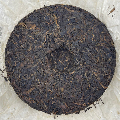 2006 Yiwuzheng Mountain Wild Raw Pu-erh Tea Cake, 380g