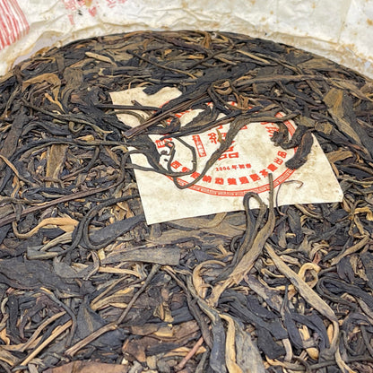 Xishuangbanna Yiwu Zhengshan Wild Green Cake Raw Pu-Erh Tea 2006 – 380g