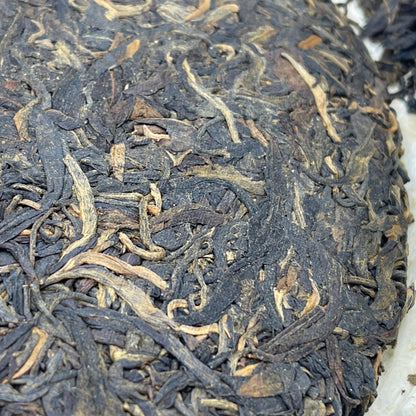 Pu-Erh tea,1999,Hong Kong customization Traditional Chinese thick paper 7542,357g,Raw