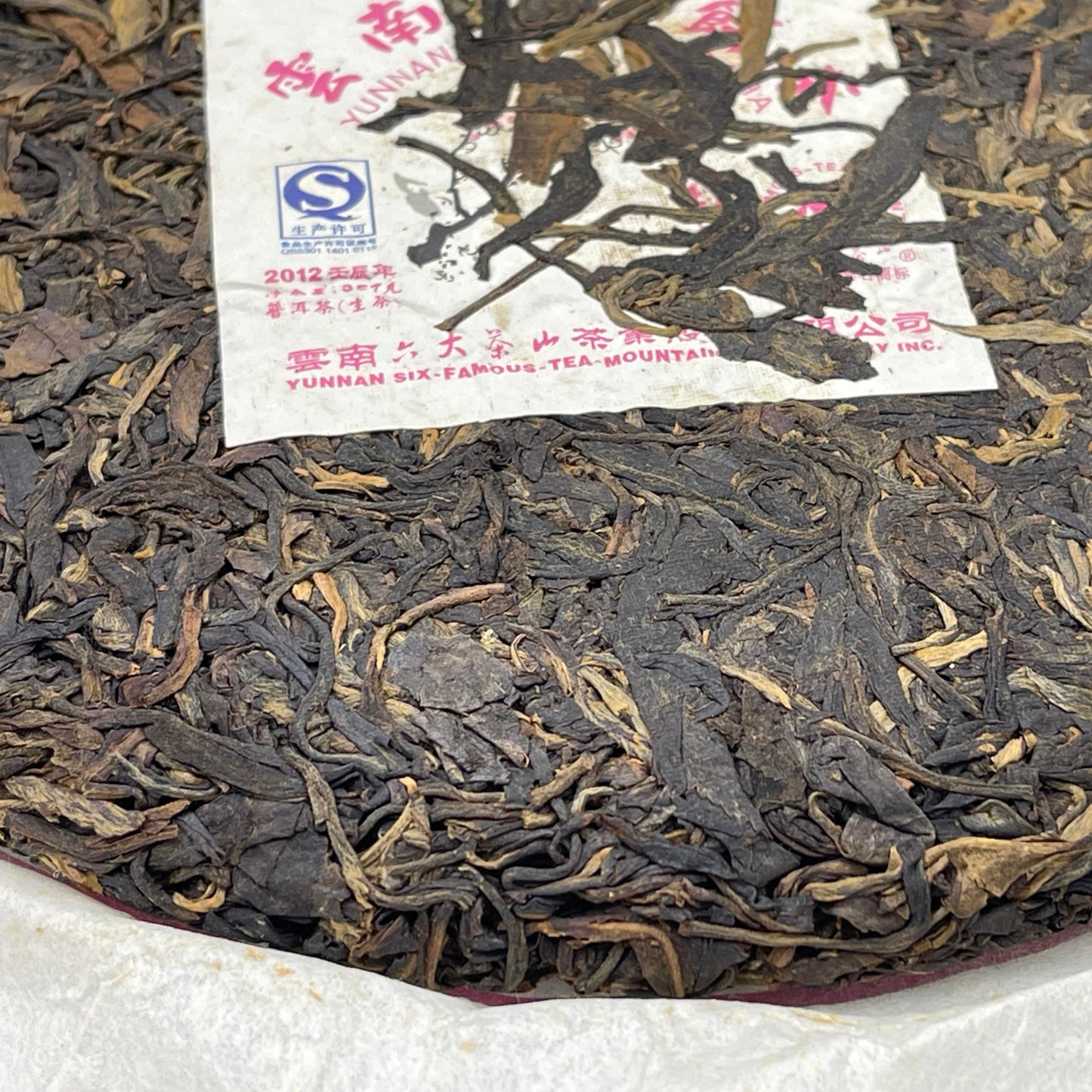 Pu-Erh tea,2012,SIX FAMOUS TEA MOUNTAIN,Plum Blossom,357,Raw