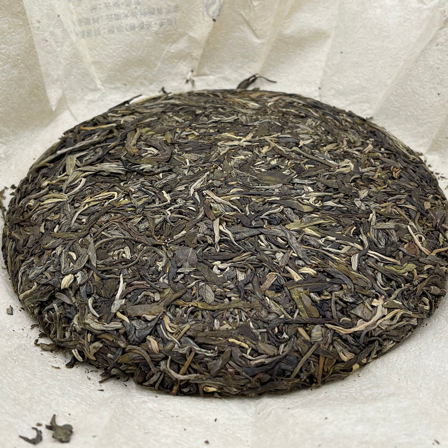 Sheng Jia Yuan Yibang 2009 Raw Pu-Erh Tea Cake 357g