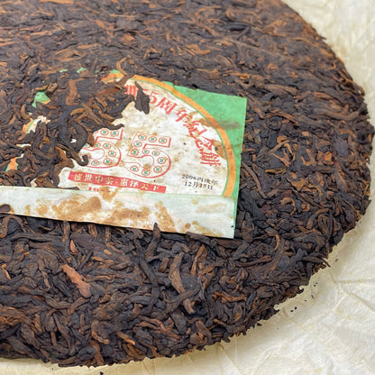 2006 China Tea 55th Anniversary Ripe Pu-erh Tea Cake, 357g