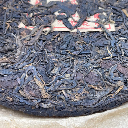 Late 80s Ying Min Yuannian Qizi Raw Pu-erh Tea Cake, 357g, from Yunnan