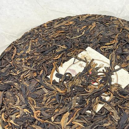 2011 Health Direction Menghai Qizi Raw Pu-erh Tea Cake, 357g, from Yunnan