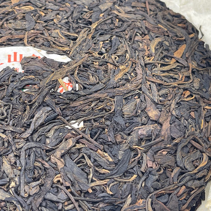 2006 Yiwuzheng Mountain Wild Raw Pu-erh Tea Cake, 380g
