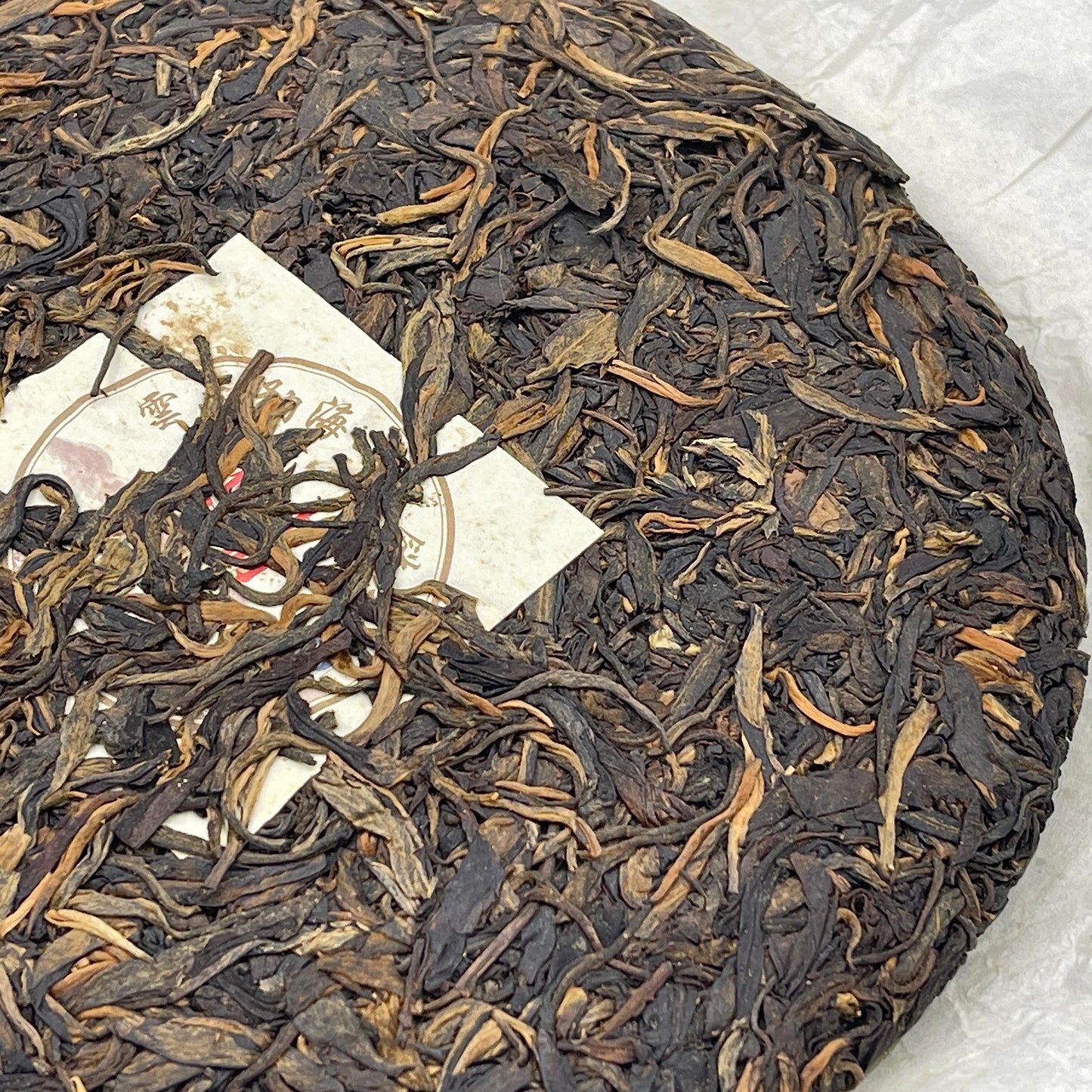 2011 Health Direction Menghai Qizi Raw Pu-erh Tea Cake, 357g, from Yunnan