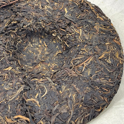 2011 Health Direction Menghai Qizi Raw Pu-erh Tea Cake, 357g, from Yunnan