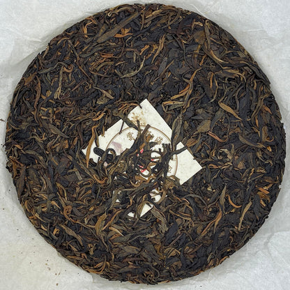 2011 Health Direction Menghai Qizi Raw Pu-erh Tea Cake, 357g, from Yunnan