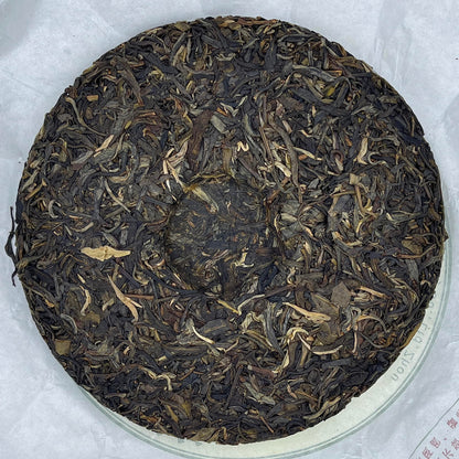 2019 Shengyu Wolongxuan 70th Anniversary Commemorative Raw Pu-erh Tea Cake, 357g, from Yunnan