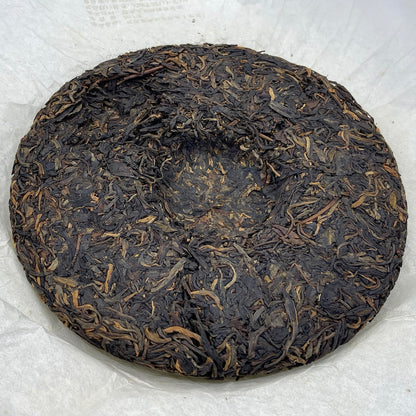2011 Health Direction Menghai Qizi Raw Pu-erh Tea Cake, 357g, from Yunnan